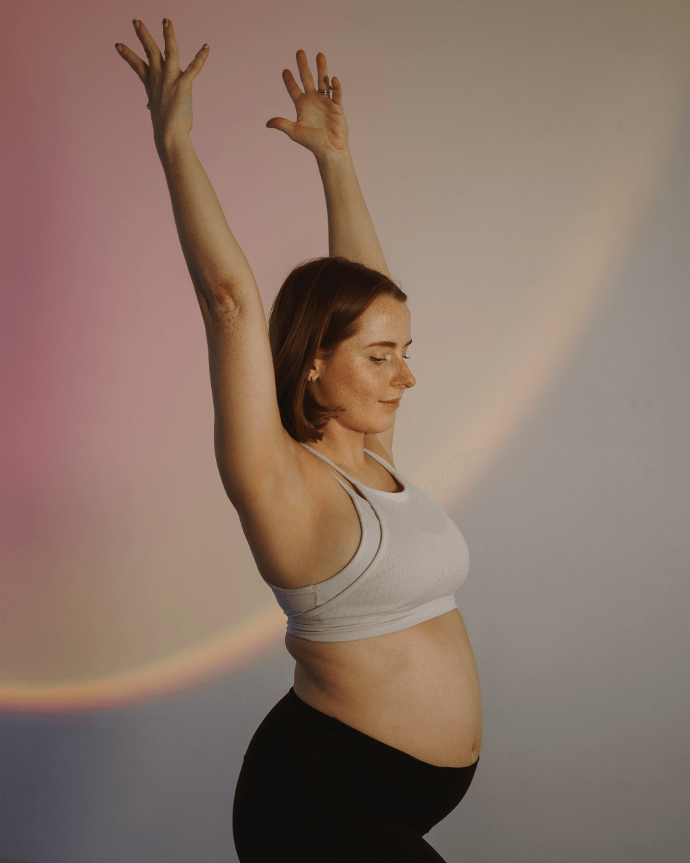 Teacher in Prenatal Flow class (Yoga + Pilates)